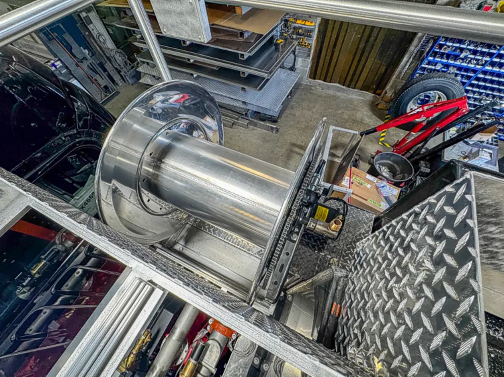 Apparatus in production bay with hood open, photo 91 of 303.